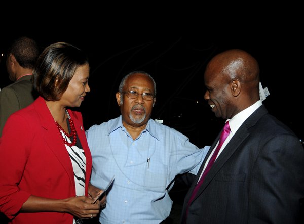 Winston Sill / Freelance Photographer
Launch of Dr. Henry Lowe Autobiography titled "It Can Be Done", held at Eden Gardens, Lady Musgrave Road on Wednesday night November 28, 2012.Here are Sonia Fuller (left); Neville Blythe (centre); and Custos Steadman Fuller (right).