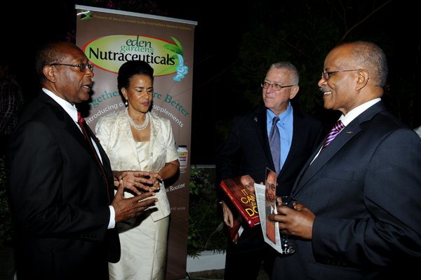 Winston Sill / Freelance Photographer
Launch of Dr. Henry Lowe Autobiography titled "It Can Be Done", held at Eden Gardens, Lady Musgrave Road on Wednesday night November 28, 2012. Here  are Dr. Lowe (left), Chairman, Environmental Health Foundation; Janet Lowe (second left); Ronald Thwaites (second right), Minister of Education; and Sir Kenneth Hall (right).