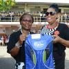 Ian Allen/Photographer
Avis Walker-Gordon left, Vice Principal at the Holy Family Primary School in Kingston presents Joan Kitson right, grade six teacher with a  Gleaner 180th Anniversary bag for Teachers Day on Wednesday.