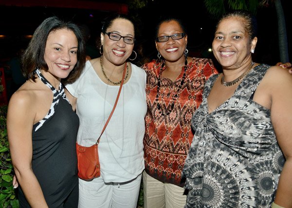 Rudolph Brown/Photographer
From left Simone Foote, Doreen Gilzean, Grace Miles and Sheron Gilzean at the IAJ Christmas in November party held at the Guardian Life car park in New Kingston on Saturday, November 16, 2013.