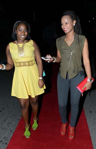 Rudolph Brown/Photographer
Christal Anderson, (left) and Vanessa Miekle at the IAJ Christmas in November party held at the Guardian Life car park in New Kingston on Saturday, November 16, 2013.