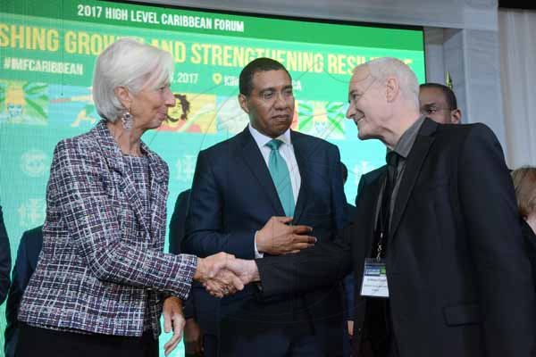 Rudolph Brown/ PhotographerPrime Minister Andrew Holness in discussion with Christine Lagarde, IMF Managing Director and Anthony Clayton of UWI at the opening Ceremony of IMF High Level Caribbean Forum at the Jamaica Pegasus Hotel on Thursday, November 16, 2017