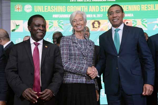 Rudolph Brown/ PhotographerPrime Minister Andrew Holness, (right) in discussion with Christine Lagarde, IMF Managing Director and Keith Mitchell, prime minister of Grenada at the opening Ceremony of IMF High Level Caribbean Forum at the Jamaica Pegasus Hotel in New Kingston on Thursday, November 16, 2017 *** Local Caption *** Rudolph Brown/ PhotographerPrime Minister Andrew Holness, (right) greets the boss of the International Monetary Fund (IMF) Christine Lagarde and Keith Mitchell, prime minister of Grenada at start of the IMF High Level Caribbean Forum yesterday.