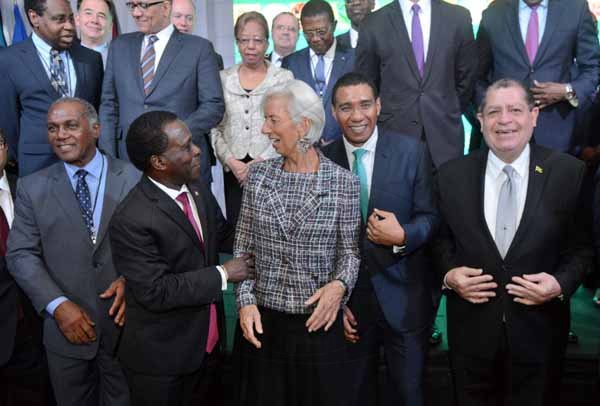 Rudolph Brown/ PhotographerChristine Lagarde, (centre) IMF Managing Director chat with from left Vance AAmory, Keith Mitchell, prime minister of Grenada, Prime Minister Andrew Holness and Audley Shaw, Finance Minister at the opening Ceremony of IMF High Level Caribbean Forum at the Jamaica Pegasus Hotel in New Kingston on Thursday, November 16, 2017