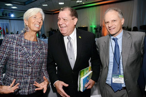 Rudolph Brown/ PhotographerBusiness DeskChristine Lagarde, IMF Managing Director chat with Audley Shaw, (centre) Finance Minister and Alejandro Werner, Director, Western Hemisphere Department of IMF at the opening Ceremony of IMF High Level Caribbean Forum on Thursday, November 16, 2017 *** Local Caption *** Rudolph Brown/ PhotographerChristine Lagarde, International Monetary Fund (IMF) Managing Director converses with Audley Shaw (centre) Jamaica's Finance and Public Service Minister and Alejandro Werner, Director, Western Hemisphere Department at the IMF at the opening the Fund's high level Caribbean forum at the Jamaica Pegasus Hotelk, New Kingston yesterday. Lagarde arrived in the island  on Wednesday for the forum heldl nder the theme ‘Unleashing Growth and Strengthening Resilience’. She is also slated to participate in other engagements involving local public and private sector leaders and organisations today. The IMF Managing Director is slated to depart Jamaica on Sunday, November 19.