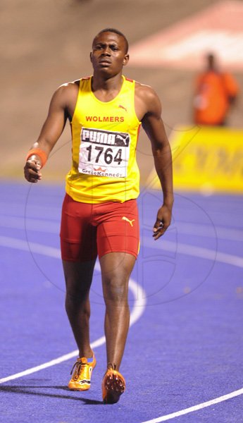 Ricardo Makyn/Staff Photographer
 Raheeem Robinson of Wolmers winner of the Boys' 100 Meter Class 2 at the Boys and Girls Champs 2012