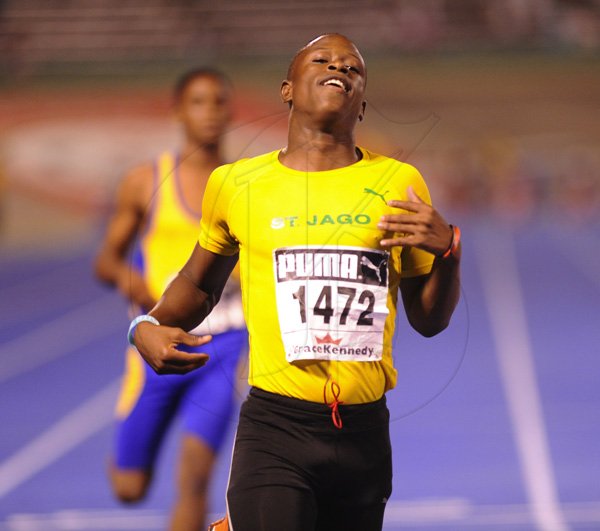 Ricardo Makyn/Staff Photographer
Raheem Chambers of St Jago winner of the Boys' Class 3,100 Final at the Boys and Girls Championships at the National Stadium on Friday 30.3.2012