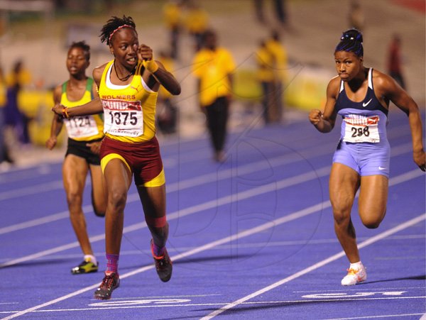 Ricardo Makyn/Staff Photographer
Shauna Helps of Wolmers Girls  winning the Girls Class 3, 100 Meters Final  at the Boys and Girls Champs 2012