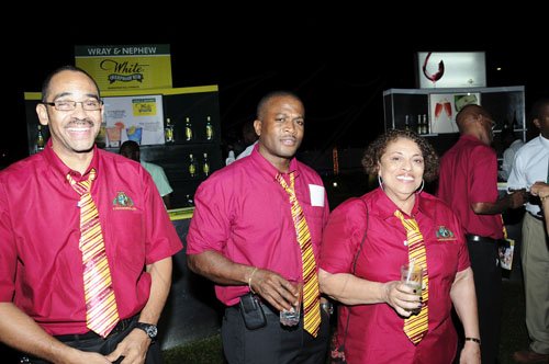 Winston Sill/Freelance Photographer
J Wray and Nephew trio (from left) Andre Sterling, Mark McDonald and Joy Spence are representing 'Wray and Nephew High' at their Skoolaz party held at the Visitor's Lodge last Wednesday.

************************************************************* December 7, 2011.