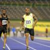 Ricardo Makyn
Asafa Powell (centre) is comfortable en route to victory during the quarter-finals of the men's 100m at the JAAA/SVL National Senior Championships inside the National Stadium last night. Powell won in a wind-aided 9.96 seconds. Kenroy Anderson (right) finished third in 10.15 while Ainsley Waugh (left) was fourth in 10.23.