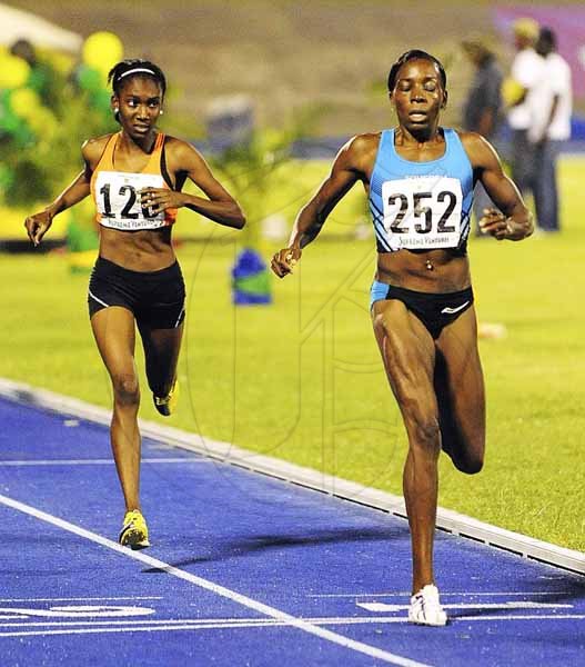 Ian Allen/Photographer
Kenia Sinclair (right) winning another national 800 metres title on day three of the JAAA/Supreme Ventures Limited National Senior Championships at the National Stadium last Saturday. The national record holder clocked 2:00.96. Natoya Goule (left) was second in a personal best 2:01.45.








Day three of Jamaica's National atlethics trials for the World Championships.