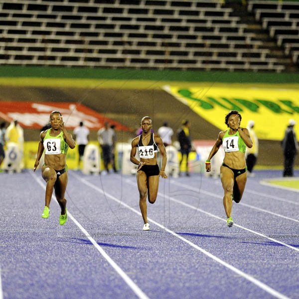 Ricardo Makyn/Staff Photographer
Veronica Campbell-Brown (left) races against Diandra Gilbert and Aleen Bailey, on the way to winning the women's 100 metres semi-final, at the Jamaica Athletics Administrative Association/Supreme Venture Limited  National Senior Championships, at the National Stadium yesterday. Campbell-Brown won in 10.95 seconds, while Bailey clocked 11.15 seconds.
