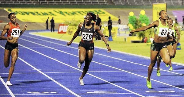 Ian Allen/Photographer
Veronica Campbell-Brown (right) winning the women's 200 metres final yesterday at the National Stadium to complete the sprint double at the JAAA/Supreme Ventures Limited National Senior Championships. Campbell-Brown won in 22.44 seconds ahead of Kerron Stewart (centre) 22.63 and Sherone Simpson (left), 22.73.