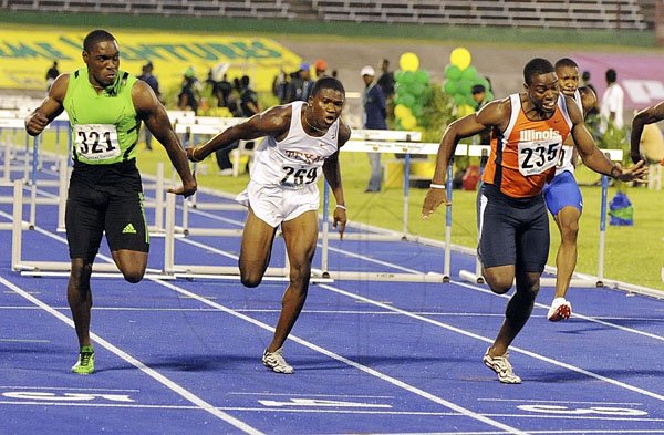 Ian Allen/Photographer
  Andrew Riley (right) finishes ahead of
Dwight Thomas (left) and Kieron Stewart.






 
was surprised by former Calabar High hurdler Andrew Riley, who took the event in a close finish in 13.36 seconds to get the better of Thomas who was second in 13.38 and Richard Phillips who ended third in 13.40 seconds.





Day four of Jamaica's trials to the World Championship at the National Stadium.