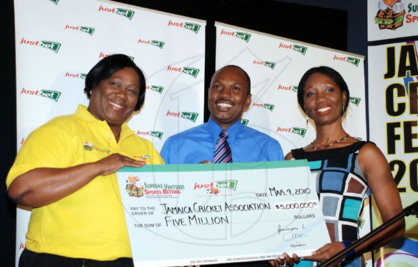 Colin Hamilton/Freelance Photographer

Sonia Davidson (second left), Vice President, Group Corporate Communications, Supreme Ventures Limited, hands over a cheque to the JCA president  Paul Campbell and Millicent Lynch, project chairman of the Jamaica Cricket Festival 2010 organizing committee at the Acropolis Gaming Lounge on Tuesday.