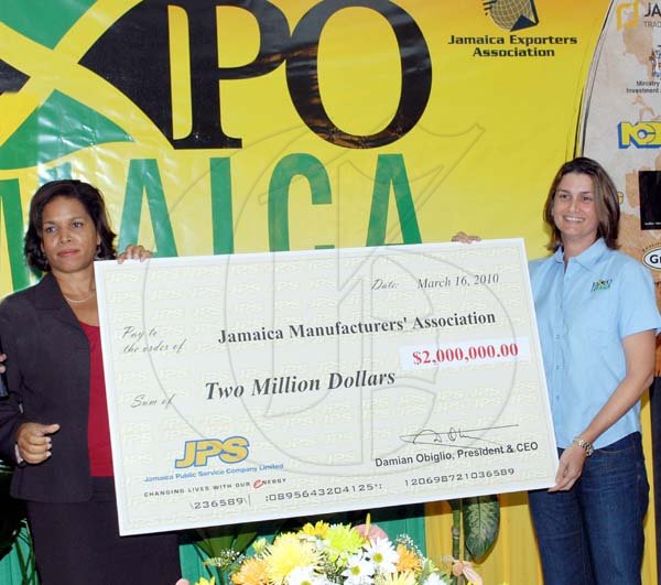 The Jamaica Public Service presents sponsorship cheque for the staging of Expo Jamaica 2010.