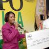 Grace presents sponsorship cheque for the staging of Expo Jamaica 2010.