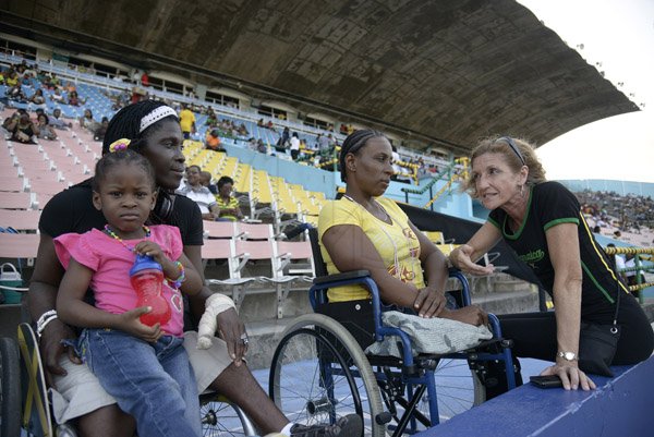 Gladstone Taylor / Photographer

Jackie Rutter (right) speaks with Sophia Johnson, Cynthia Grant looks on holding her grand daughter Atarah Anderson as seen at the jamaica invitational