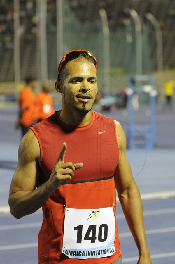 Gladstone Taylor / Photographer

Felix Sanchez celebrates his victory in the mens 400m hurdles at the jamaica invitationals