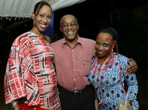 Rudolph Brown/Photographer
Johanthan Brown, president of Jamaica Cooperative Credit Union League pose with Toni-Ann Fraser, (left) and Renee Hartley at the Jamaica Co-operative Credit Union League 70’s Soiree Chrishmas party at the Boone Hall Oasis, Stony Hill. on Saturday December 8, 2012