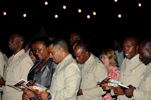 Winston Sill / Freelance Photographer
The Jamaica Defence Force (JDF) annual Open Air Carol Service 2011, held at Up park Camp on Tuesday night December 13, 2011.  Here is a section of the audience.