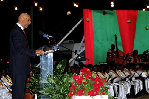 Winston Sill / Freelance Photographer
The Jamaica Defence Force (JDF) annual Open Air Carol Service 2011, held at Up park Camp on Tuesday night December 13, 2011. Here Governor General Sir Patrick Allen reading the Sixth Lesson.