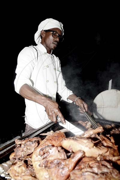Lionel Rookwood/Photographer<\n>On the chopping block to savour is mouthwatering chicken courtesy of Kemar Davis.