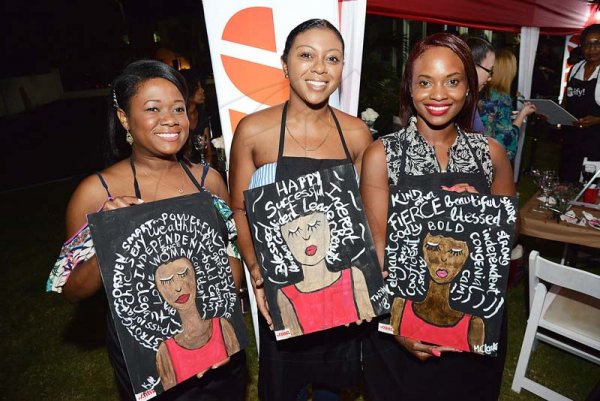 Rudolph Brown/ PhotographerJMMB IWD sip and paint at JMMB 6 Haughton Terrace Kingston on Thursday, March 8, 2018(From left) Monique Clarke, Pheonia Bennett and Kymonia Henry proudly display their paintings.