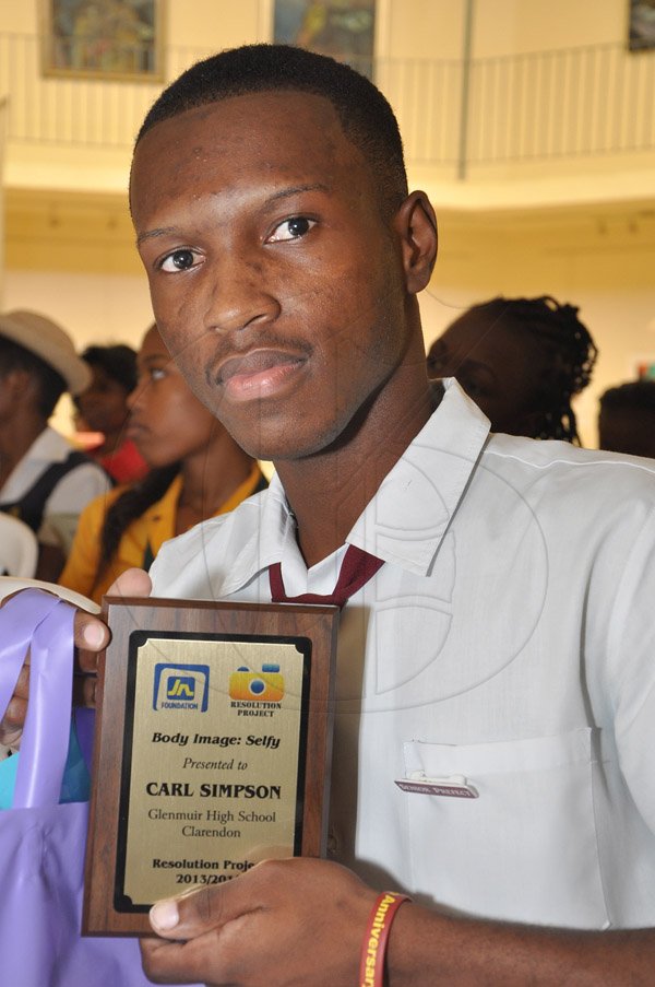Jermaine Barnaby/Photographer
Carl Simpson won for best Selfy at the JN Foundation Resolution Project Awards Ceremony at the Olympia Gallery- 202 Old Hope Road on Tuesday, July 15, 2014.