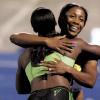 Ricardo Makyn/Staff Photographer
Jamaica's Shelly-Ann Fraser-Pryce (facing camera) embraces compatriot Veronica Campbell-Brown, following their one-two finish in the women's 200 metres, at the JN Jamaica International Invitationat, at the National Stadium on Saturday night.


 7.5.2011