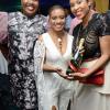 Rudolph Brown/ Photographer<\n>Time to pop out the bottles! Odette Dixon, (left) and Nicholette Williams, (right) presents a bottle to birthday girl Joan Forrest-Henry.<\n>at her 25/25 birthday celebration with families and friends at the Jamaica Pegasus Hotel in New Kingston on Saturday, June 30, 2018<\n>
