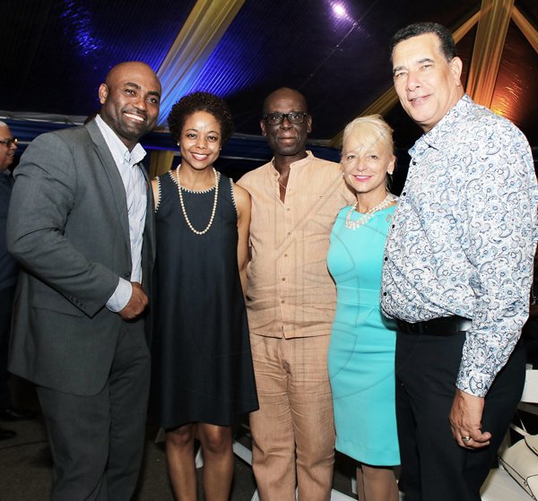 Ashley Anguin <\n>Outgoing president and CEO of JPS, Kelly Tomblin (second right)  flanked by from left:  Dr Andrew Wheatley, minister of science, energy and technology; Attorney General, Marlene Malahoo Forte; Minister of Local Government, Desmond McKenzie; and Homer Davis, mayor of Montego Bay. *** Local Caption *** @Normal:Outgoing president and CEO of JPS Kelly Tomblin (second right) is flanked by from (left) Dr Andrew Wheatley, minister of science, energy and technology; Attorney General Marlene Malahoo Forte; Minister of Local Government Desmond McKenzie; and Homer Davis, mayor of Montego Bay.