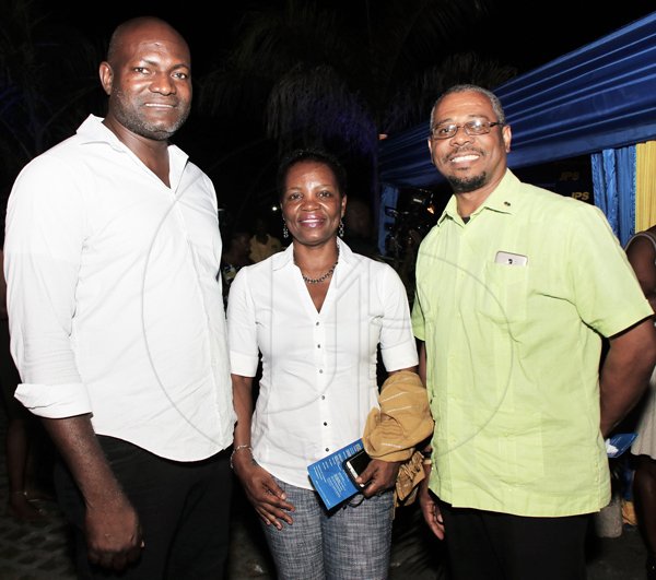 Starting from left- Parish Councillor, Kerry Thomas, Doreen and husband Patrick Prendergast (Acting Director UWI, Mona-Western Jamaica Campus *** Local Caption *** @Normal:All smiles for our lens are from left: Parish Councillor, Kerry Thomas, Doreen Pendergast, and her husband Patrick, acting director of UWI Mona-Western Jamaica Campus.