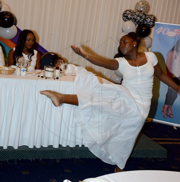 Winston Sill/Freelance Photographer
Judith Thompson 40th Birthday Celebrations and Engagement, held at the Jamaica Pegasus Hotel, New Kingston on Saturday night April 5, 2014. Here Brittney Robotham (right) performs a dance for her Mom Judith Thompson (left).