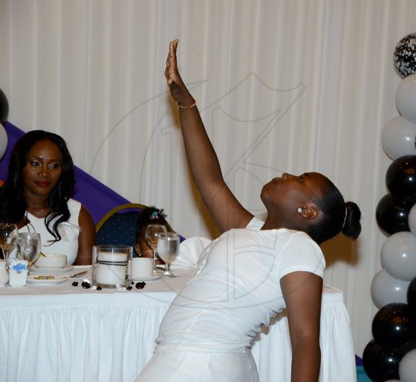 Winston Sill/Freelance Photographer
Judith Thompson 40th Birthday Celebrations and Engagement, held at the Jamaica Pegasus Hotel, New Kingston on Saturday night April 5, 2014. Here Brittney Robotham (right) performs a dance for her Mom Judth Thompson (left).