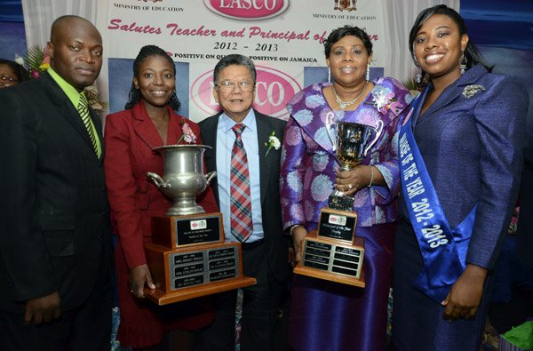 Rudolph Brown/Photographer
Lascelles Chin (centre), executive chairman of LASCO Affiliated Companies pose with from left Lasco Officer of the year 2012 Corporal Oneil Patterson, Dageama Spencer-Hull, teacher of the year from Holland High School, Rollington Town Primary School principal Dr. Magared Bailey, principal of the year and  Victoria Melhado, (right) LASCO Nurse of the Year 2012/2013 at the LASCO 2012-2013 Teacher and Principal of the Year Awards at the Wyndham Hotel in New Kingston on Tuesday, December 4, 2012