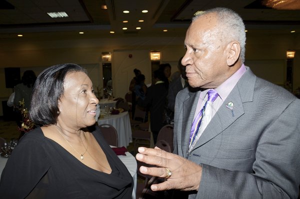 Rudolph Brown/Photographer
Glen Bromfield has the attention of  Dorothy Lightbourne.

*********************************************************************** at the Lay Magistrates Association of Jamaica (Kingston Chapter) Annual Banquet at the Wyndam Kingston Hotel on Saturday, September 24-2011