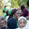 Rudolph Brown/PhotographerOutdoor agent Latoya Daley, (left) hold baby Austin Lewis while her mother voting in the Local Government election at Red Hill Primary School on Monday November 28, 2016