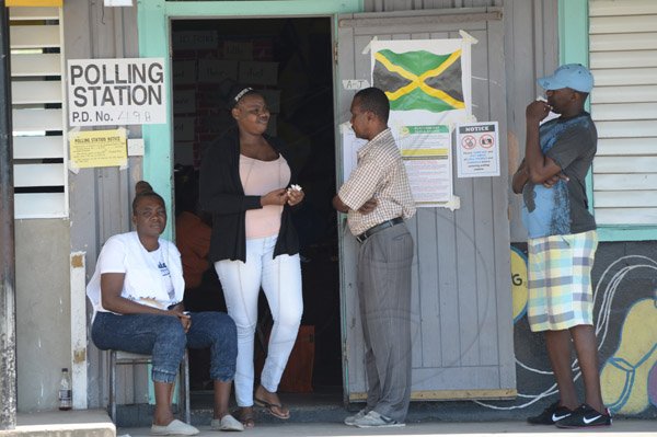 Jermaine Barnaby/Freelance Photographer
Voters waiting in line at Mountain View Primary school during the local Government election on Monday November 28, 2016.