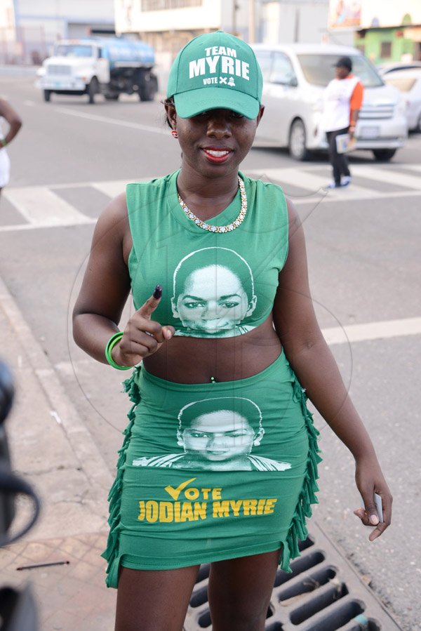 Rudolph Brown/Photographer
JLP supporter on Molynes Road in Kingston on local Government election on Monday, November 28, 2016