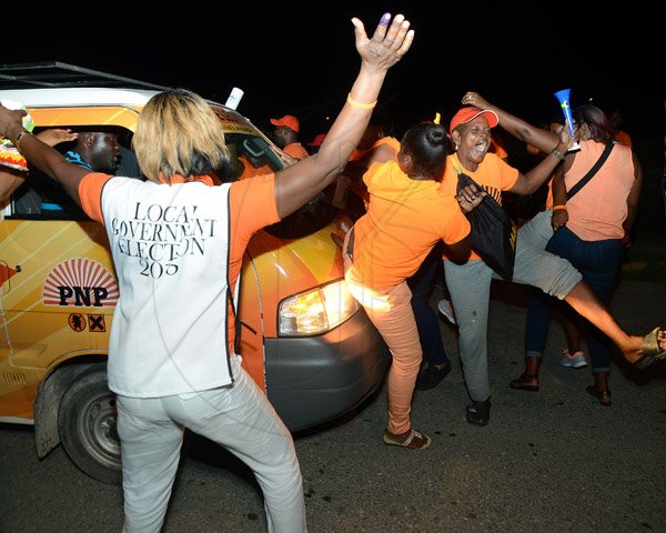 Ian Allen/Photographer
PNP supporters celebrating at the counting centre at Ascot High school.