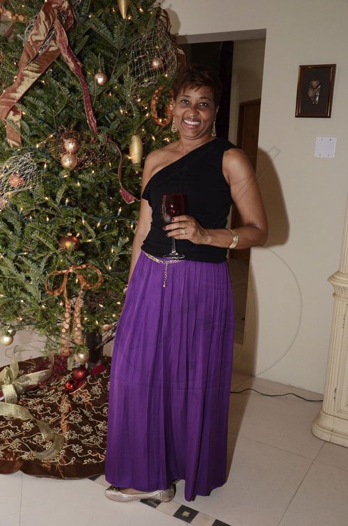 Contributed
Lorna Phillips and Manley Nicholson's Xmas Party on December 11, 2011.
A fabulous Mignonette Reynolds gets ready to sip her mulled wine.