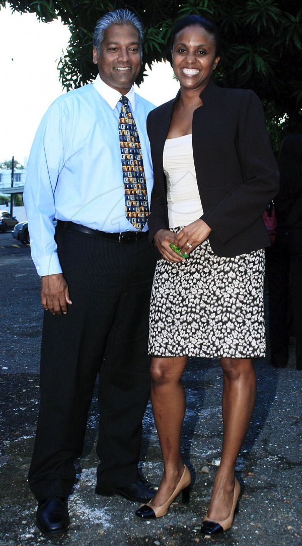 Colin Hamilton/Freelance Photographer
PROComm hosted a farewell cocktail party for departing Digicel CEO Mark Linehan and member of staff Staci Smith at their Kingsway Ave office on Wednesday August 22, 2012.
Newlyweds Tricia and Nari Williams-Singh.