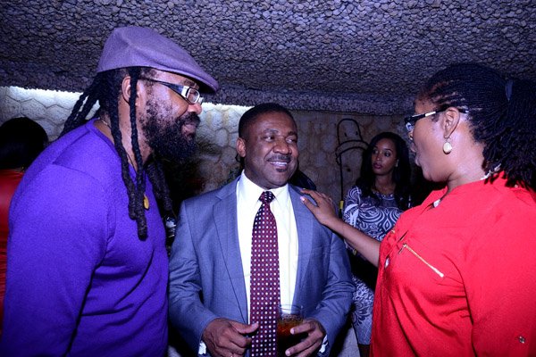 Winston Sill/Freelance Photogtapher
KSAC Mayor Angela Brown-Buirke host Christmas, Media and Corporate Mingle, held at Villa Ronai, Old Stony Hill Road on Friday night December 27, 2013. Here are Tont Rebel (left); Minister Phillip Paulwell (centre); and Mayor Brown-Burke (right).