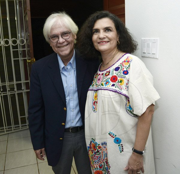 Gladstone Taylor/ Freelance Photographer 
Brazil ambassador Carlos Den Hartog and host ambassador Cecilia Jaber (right) were all smile for our camera