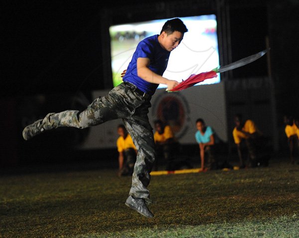 Ian Allen/Photographer
A member of the People's Republic of China Liberation Army in performance at the Jamaica Military Tattoo at Up Park Camp on Thursday June 28.