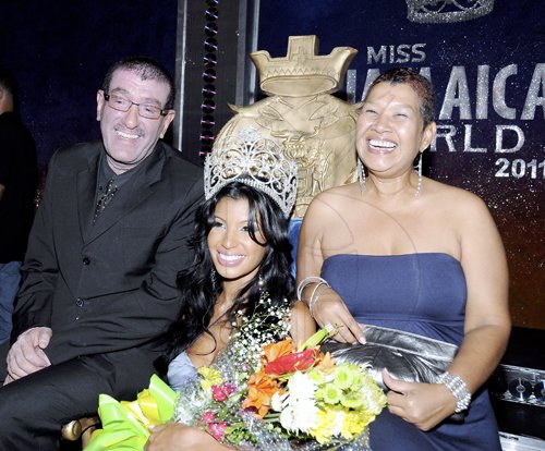 Winston Sill / Freelance Photographer
The new Miss Jamaica 2011  Danielle Crosskill flanked by proud parents her father Simon and mother Patricia. at the grand coronation  on Saturday at Jamaica Pegasus hotel.


Miss Jamaica world.