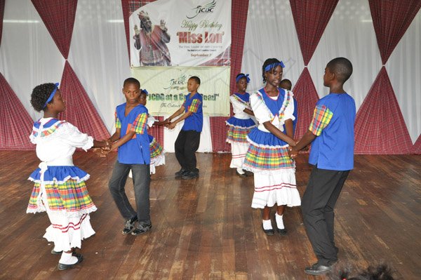 Jermaine Barnaby/Photographer
Drews Avenue Primary students during their Quadrille dancing at  Miss Lou's 94th Birthday Anniversary Celebrations organised by the Jamaica Cultural Development Commission (JCDC), at the LOUISE BENNETT GARDEN THEATRE, HOPE ROAD, KINGSTON on Saturday September 7, 2013.