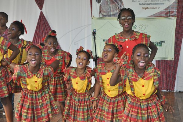 Jermaine Barnaby/Photographer
Students of Rousseau Primary school  perform "Hear So" at Miss Lou's 94th Birthday Anniversary Celebrations organised by the Jamaica Cultural Development Commission (JCDC), at the LOUISE BENNETT GARDEN THEATRE, HOPE ROAD, KINGSTON on Saturday September 7, 2013.