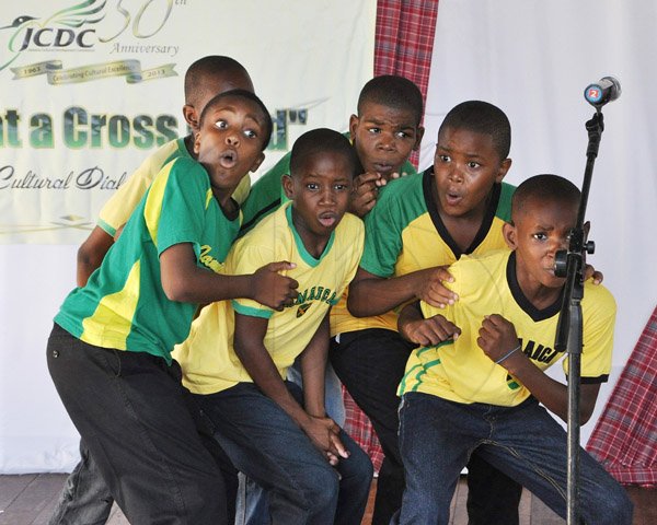 Jermaine Barnaby/Photographer

Members of the Clan Carty Primary school perform Pedestrian Crosses during  Miss Lou's 94th Birthday Anniversary Celebrations organised by the Jamaica Cultural Development Commission (JCDC), at the Louise Bennett Garden Theatre, Hope Road, Kingston on Saturday.